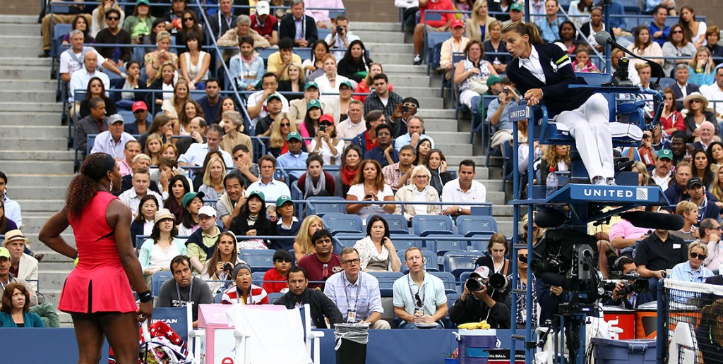 Eva Asderaki-Moore (R) docks Serena Williams a point penalty for intentional hinderance during Williams' 2011 US Open women's singles final match against Sam Stosur; Getty Images