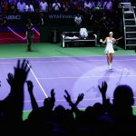 Kerber hits balls to the fans in Singapore. Photo: Getty Images