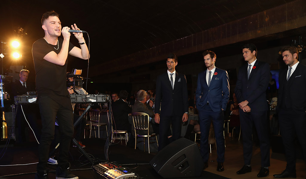 (L-R) Djokovic, Murray, Raonic and Wawrinka watch Thepetebox perform in London; Getty Images