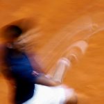 Novak Djokovic in flight. Photo: Getty Images