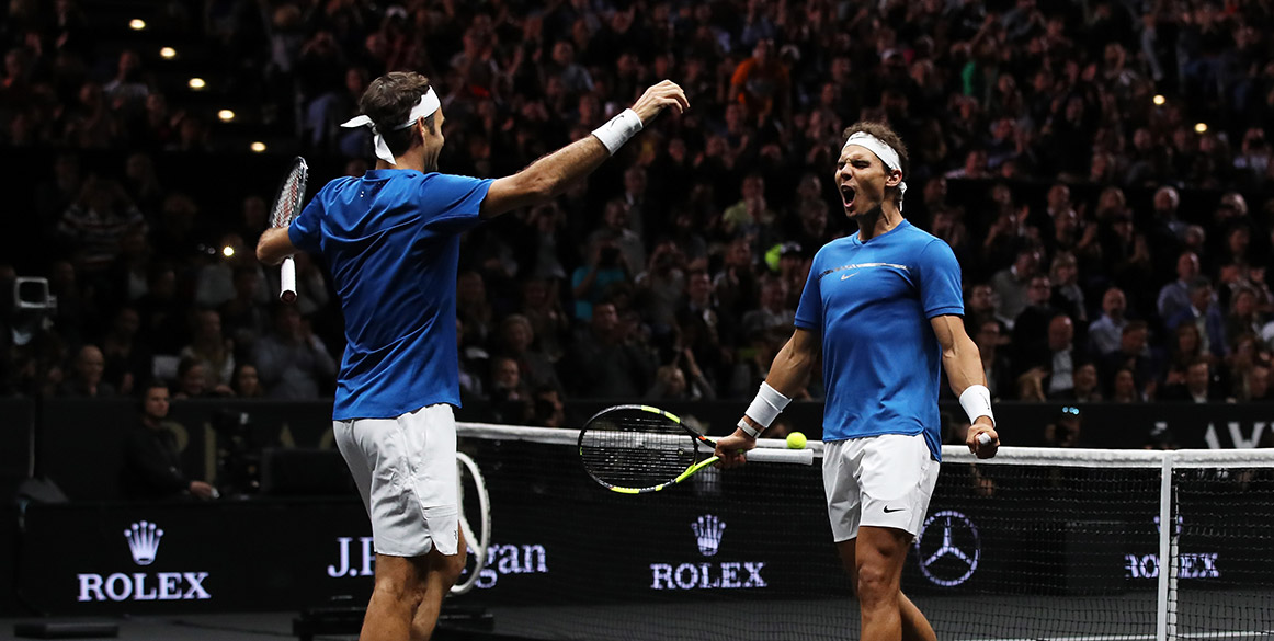 Rafael Nadal (R) and Roger Federer celebrate their doubles victory at the Laver Cup; Getty Images