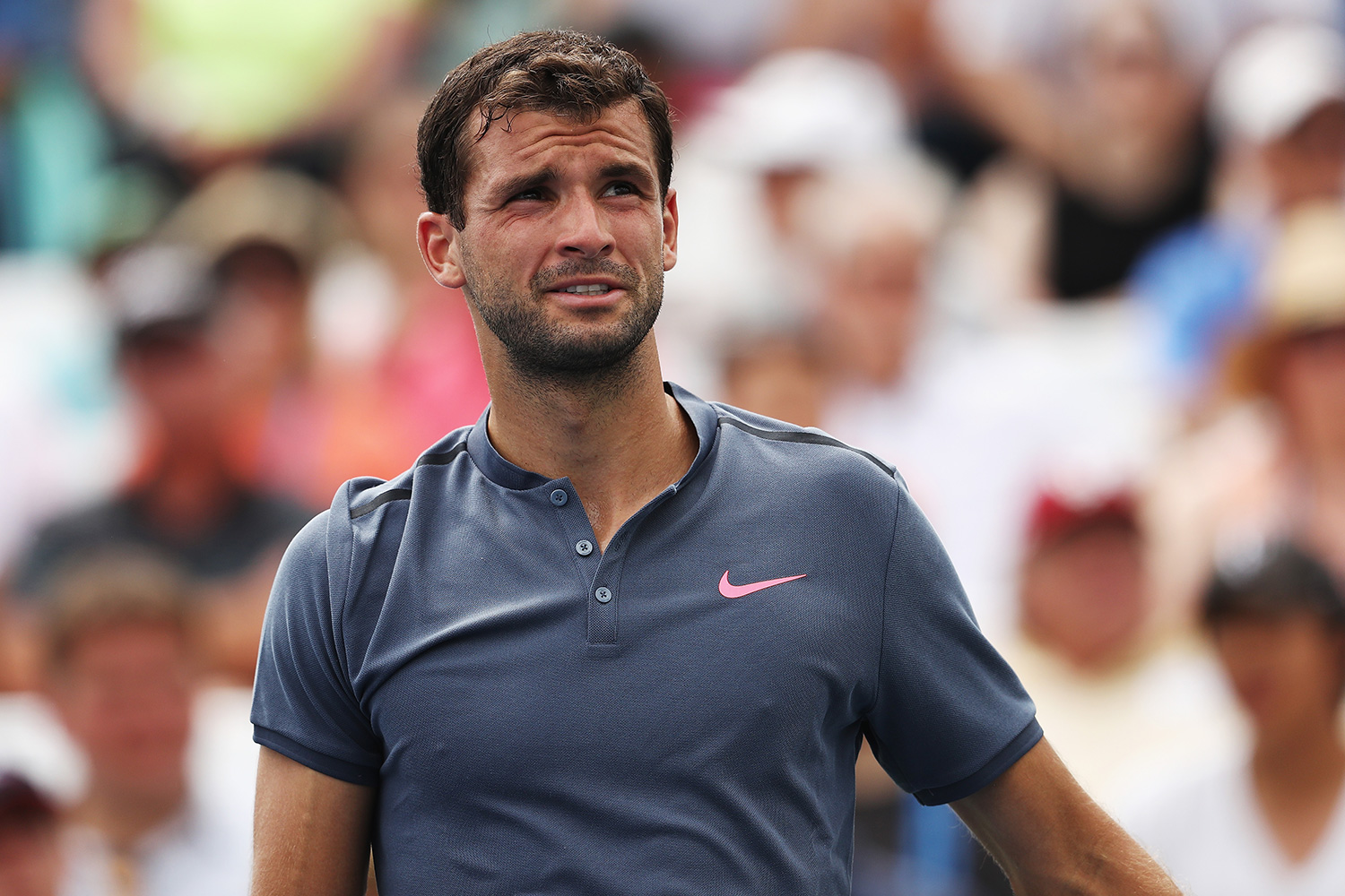 Cincinnati champion Grigor Dimitrov crashed out in straight sets against An...