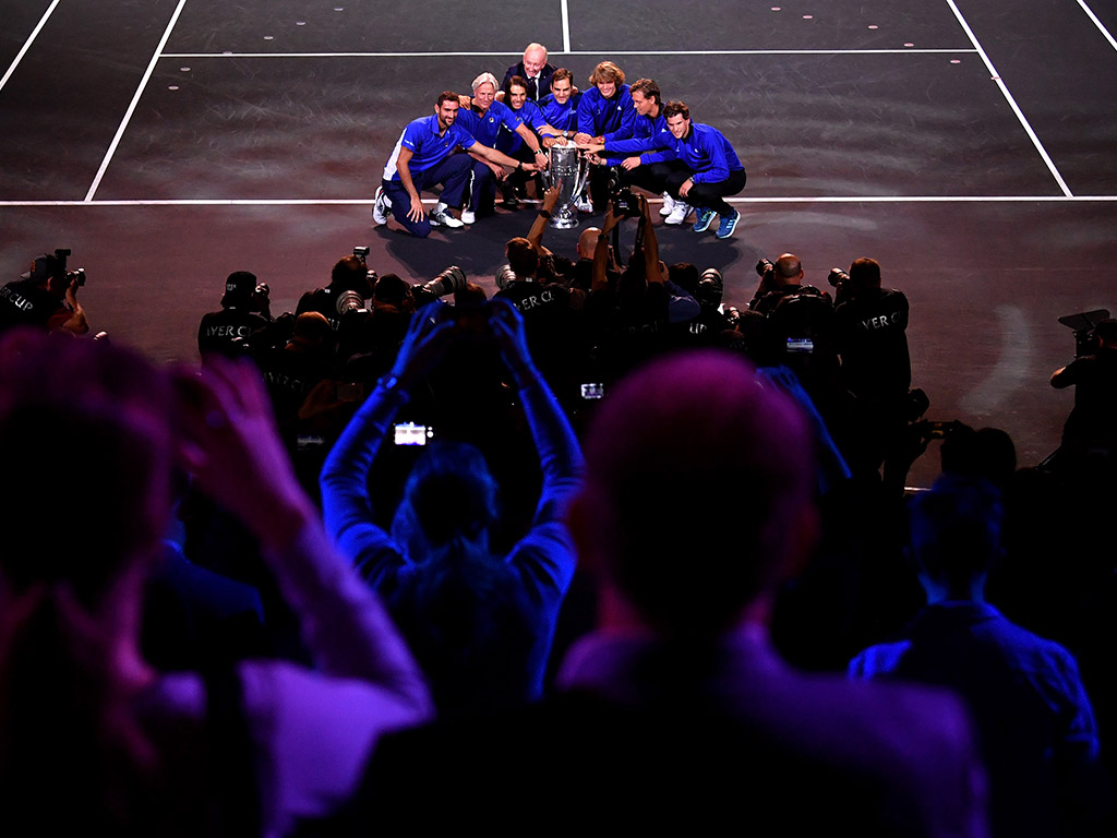 Team Europe (L-R Marin Cilic, Bjorn Borg, Rafael Nadal, Roger Federer, Alexander Zverev, Tomas Berdych, Dominic Thiem) pose with Rod Laver and the Laver Cup, as fans look on in Prague; Getty Images
