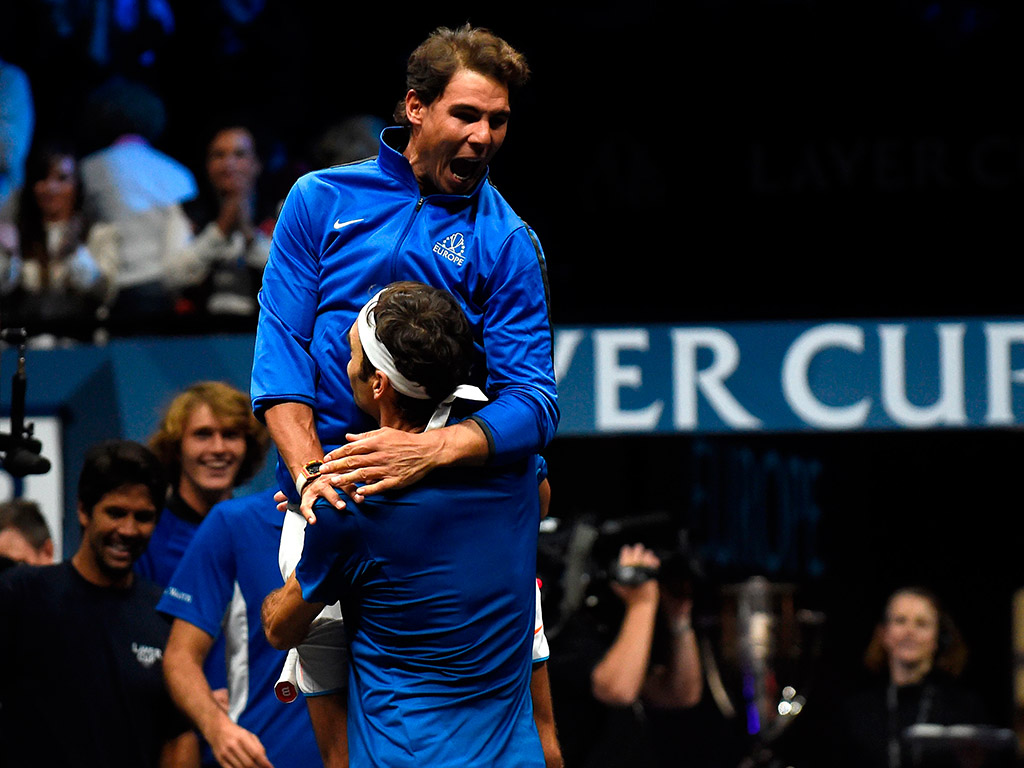 Rafael Nadal celebrates Team Europe's Laver Cup victory with Roger Federer after Federer beat Nick Kyrgios in match 12; Getty Images