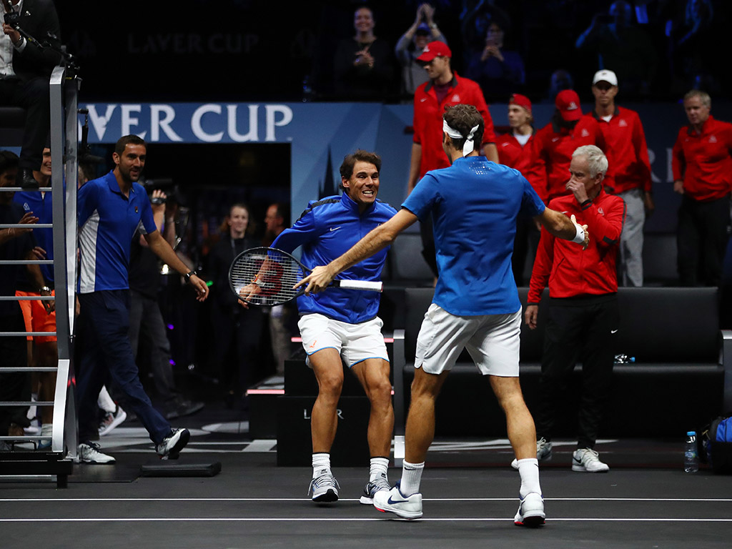 Rafael Nadal celebrates Team Europe's Laver Cup victory with Roger Federer after Federer beat Nick Kyrgios in match 12; Getty Images