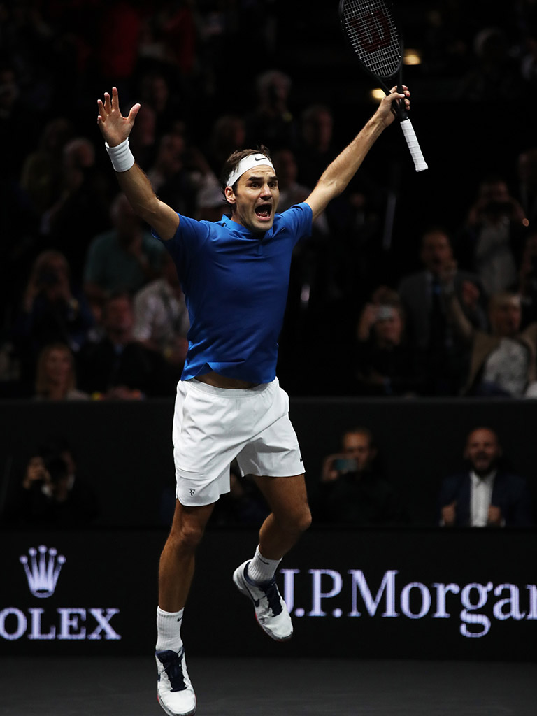 Roger Federer celebrates his win over Nick Kyrgios, sealing victory for Team Europe in the Laver Cup; Getty Images