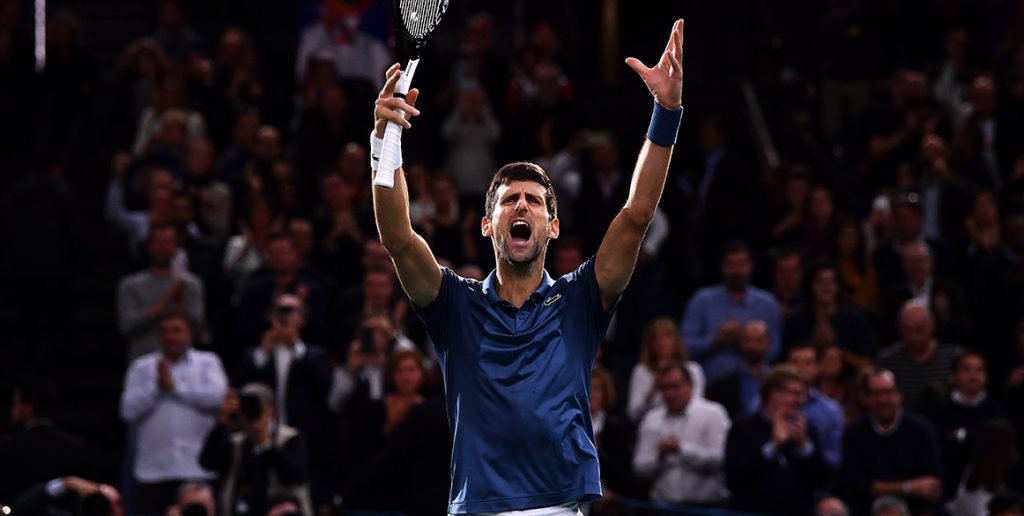 Novak Djokovic celebrates his semifinal victory over Roger Federer at the Paris Masters; Getty Images
