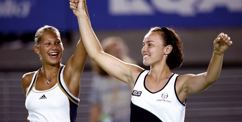 Martina Hingis (R) and Anna Kournikova celebrate their women's doubles title at Australian Open 1999 (Getty Images)
